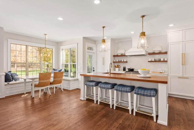 Custom black walnut butcher block countertop installed in a finished kitchen