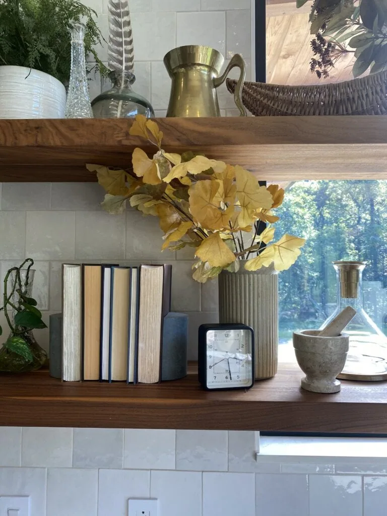 Floating shelf styled with flowers